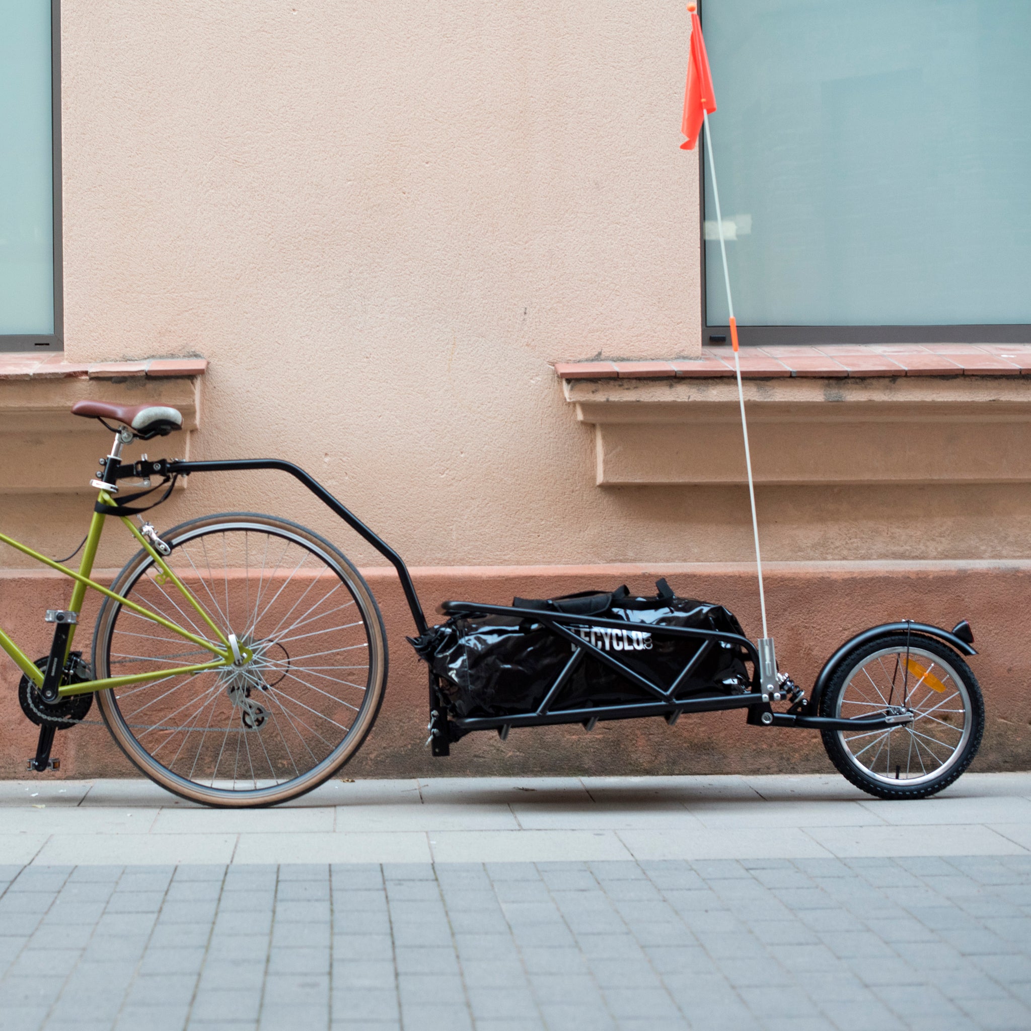 Remorque vélo cargo mono-roue avec amortisseur et sac étanche 100L