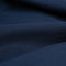 Texture fine de la serviette microfibre Hyperlight Cocoon 555 bleu marine, idéale pour cyclistes recherchant légèreté et efficacité