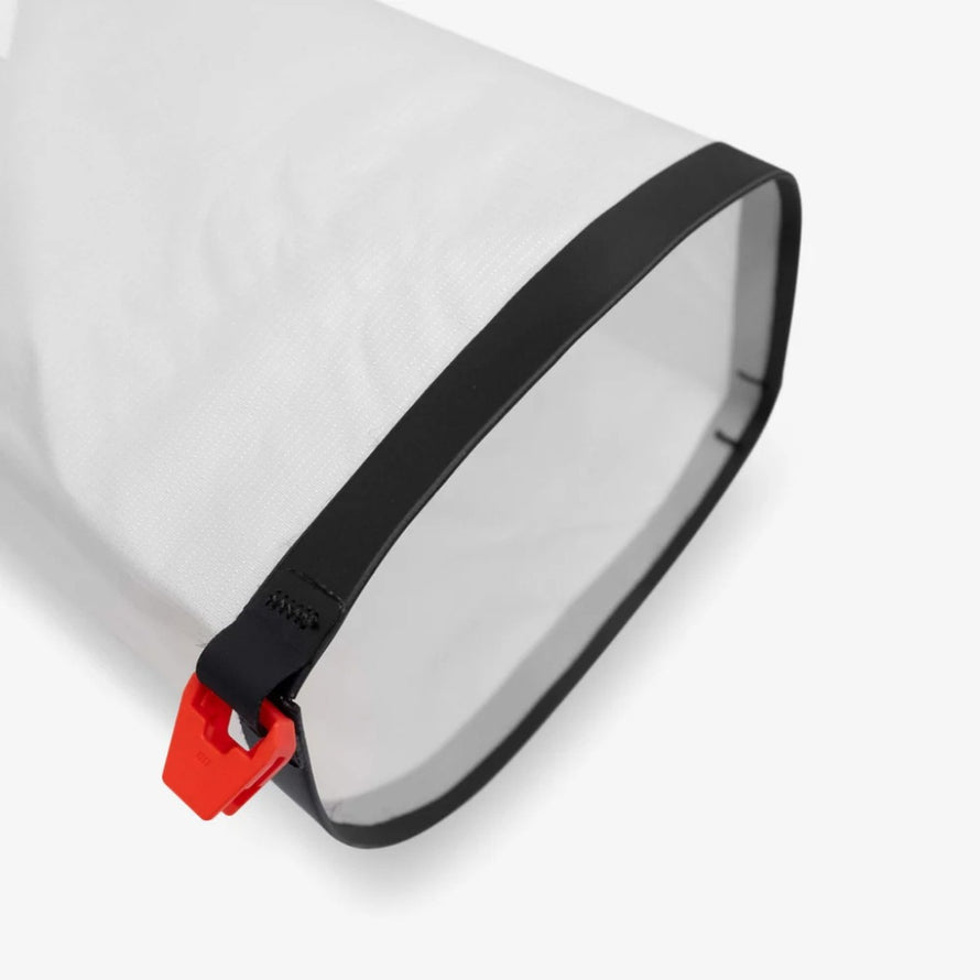 Sacoche de cintre Cyclite Roll Bag 02 77 blanche avec fermeture rouge, pratique et imperméable pour cyclisme