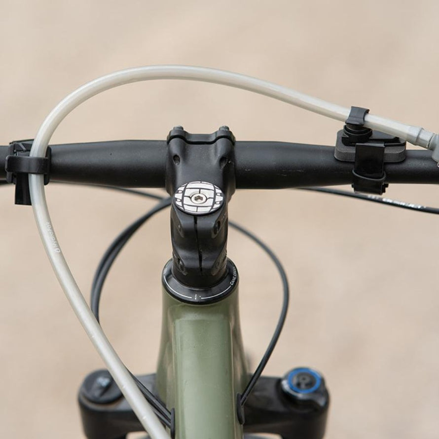 Fixation pour tuyau d'hydratation Revelate Design Barnacle montage que sur guidon