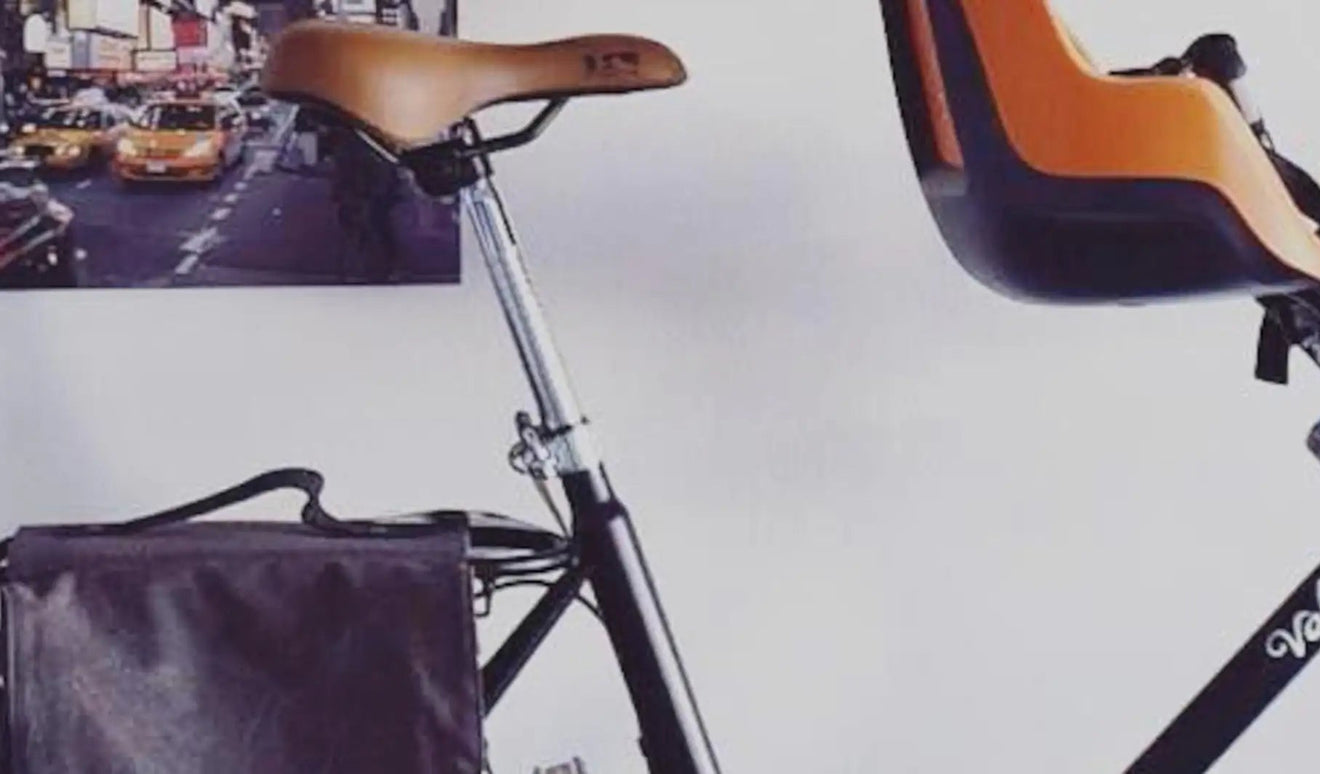 Installer des sacoches vélo avec un siège enfant sur porte-bagages