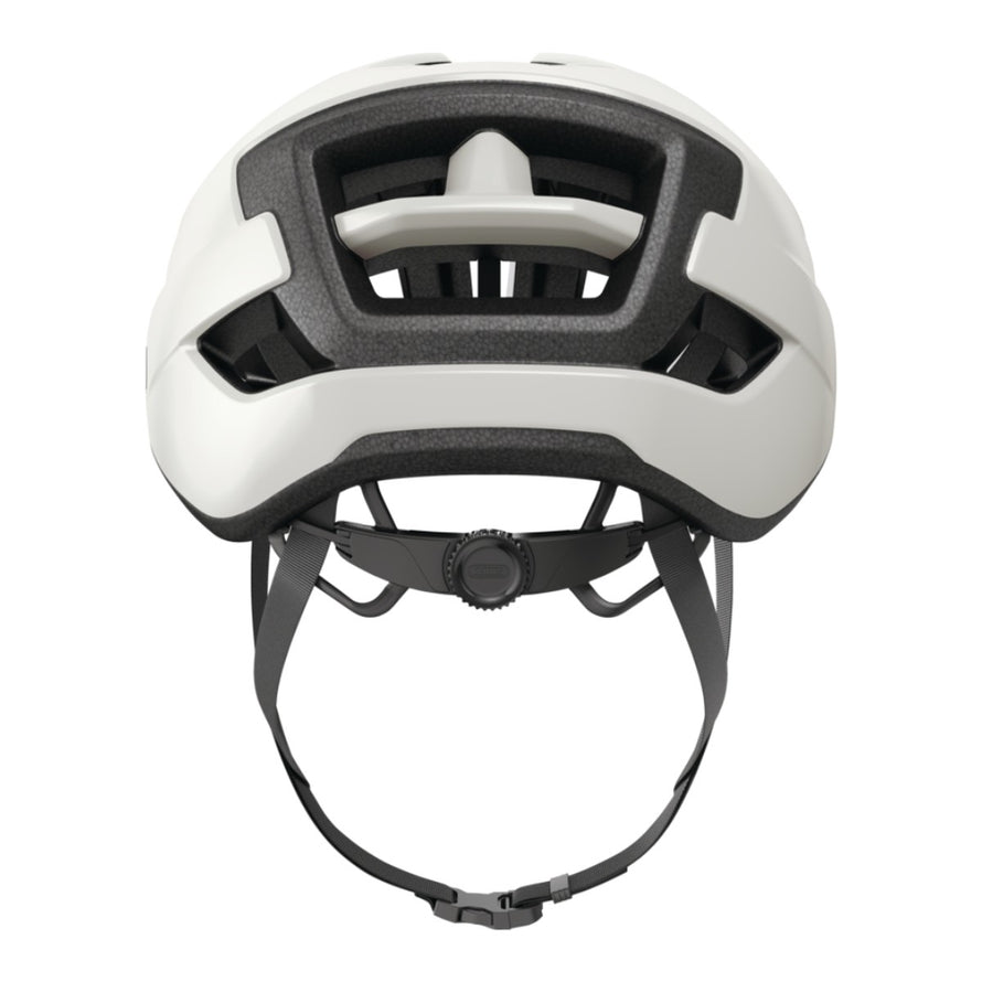 Casque Abus WingBack blanc pour velo route et gravel, vue arriere avec systeme de ventilation performant et ajustement precis