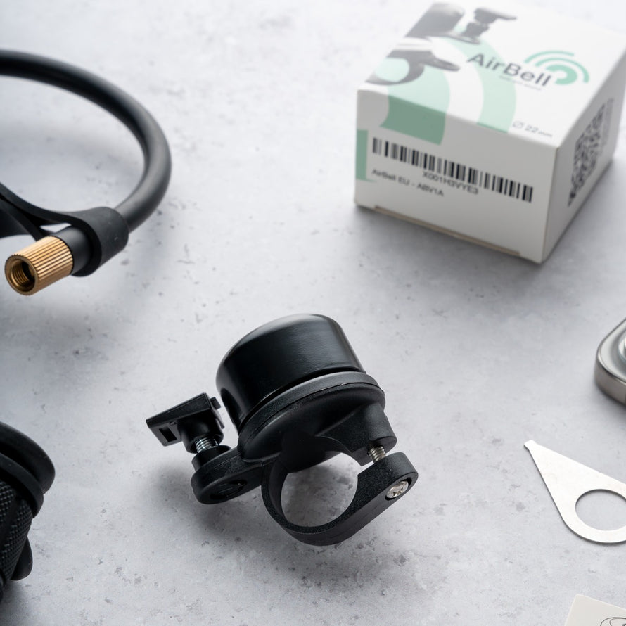 Sonnette AirBell Original 22 mm noire avec support AirTag intégré pour guidon vélo compatible Apple AirTag