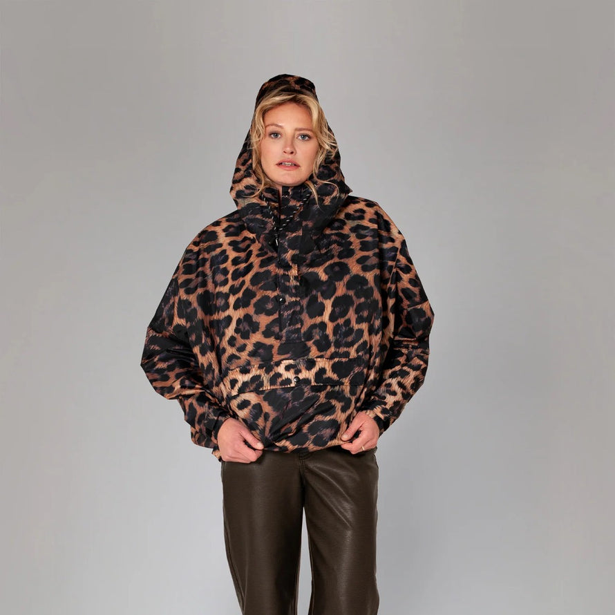 Anorak impermeable Rainkiss motif leopard pour velo, style unique et protection optimale contre la pluie