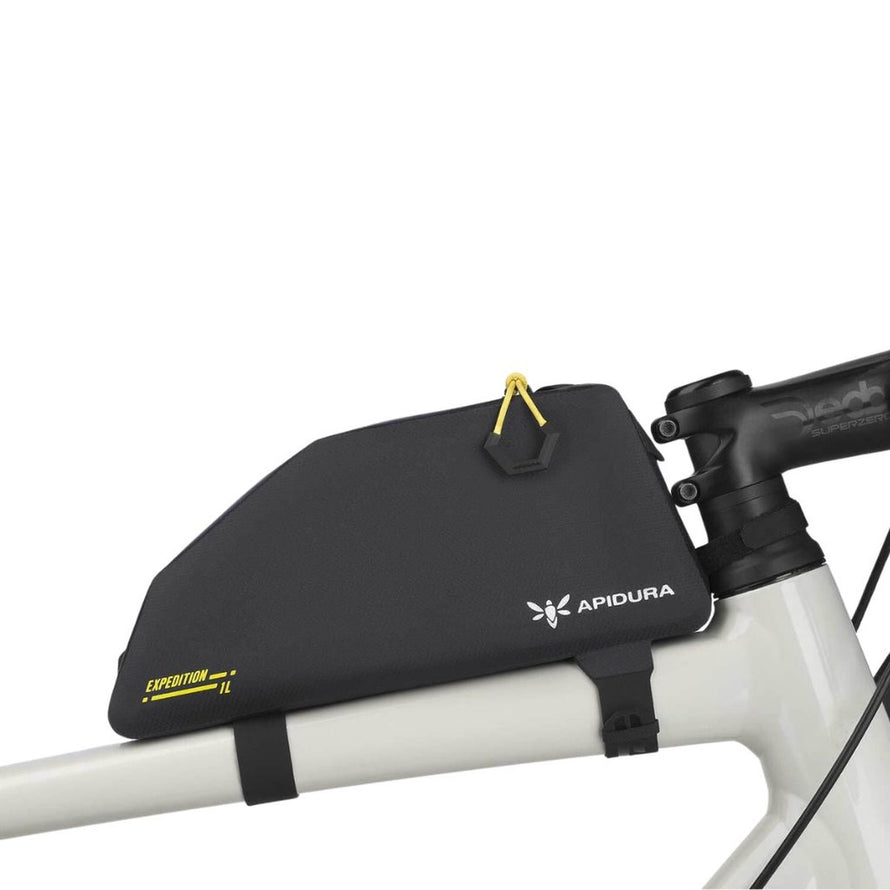Sacoche top tube Apidura Expedition 1L noire pour vélo, idéale pour le bikepacking et les longues sorties