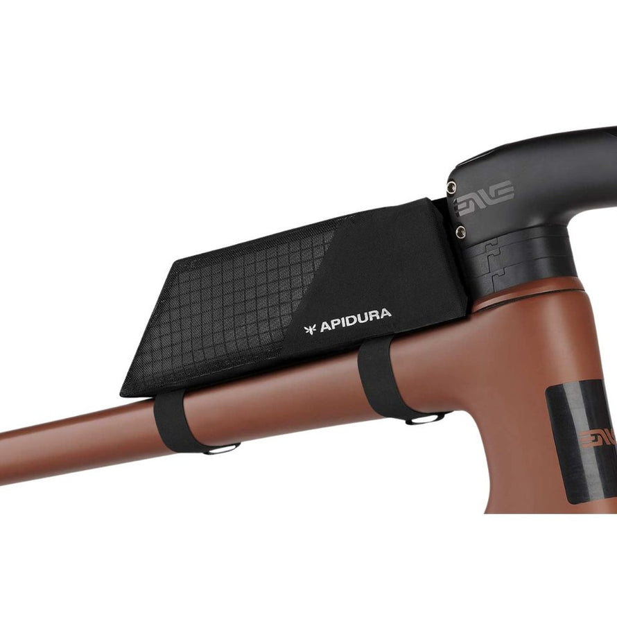 Sacoche Apidura Aero 0.4L fixee sur tube superieur de velo, design compact et resistant pour cyclisme
