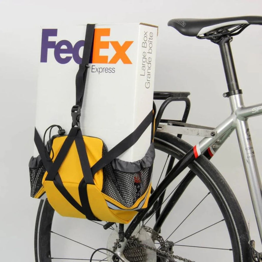 Sacoche Arkel Haul-it jaune fixée sur porte-bagages vélo, grande capacité pour transport sécurisé et pratique