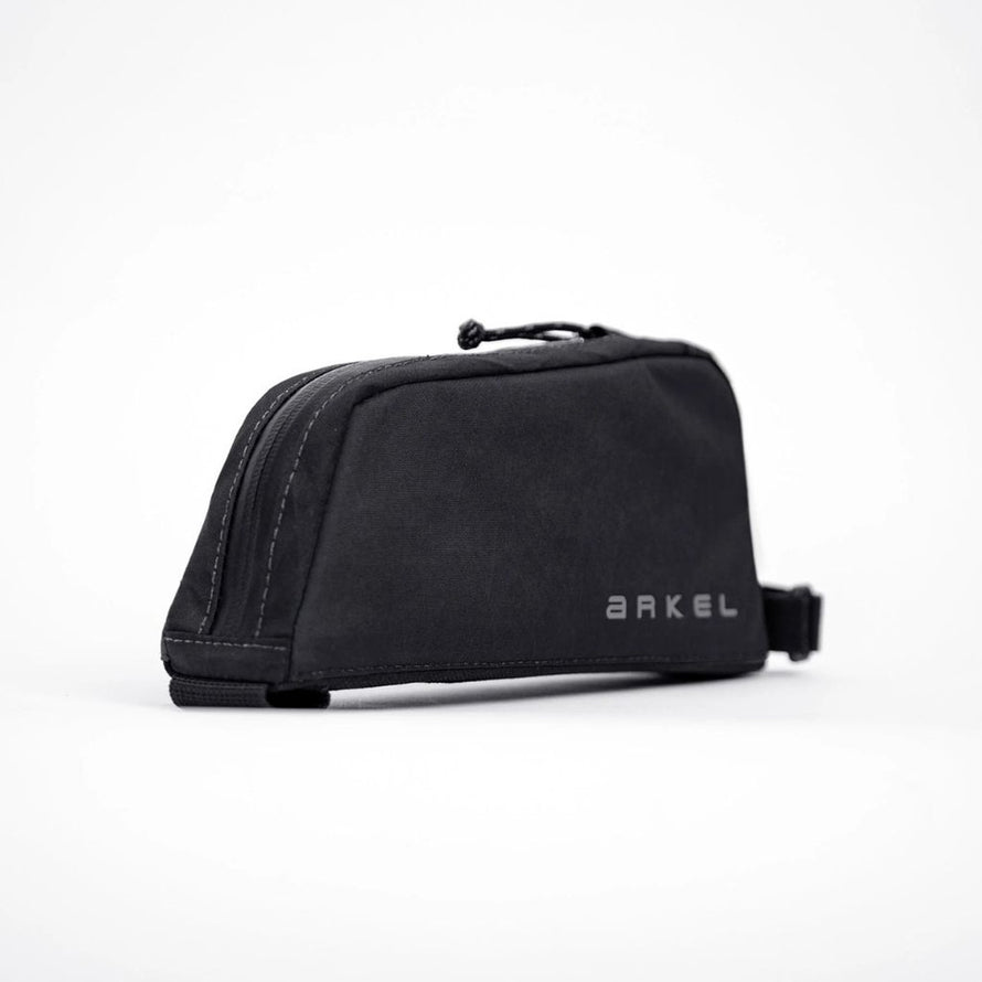 Sacoche top tube Arkel Taco noire, compacte et résistante pour transporter accessoires vélo en toute sécurité