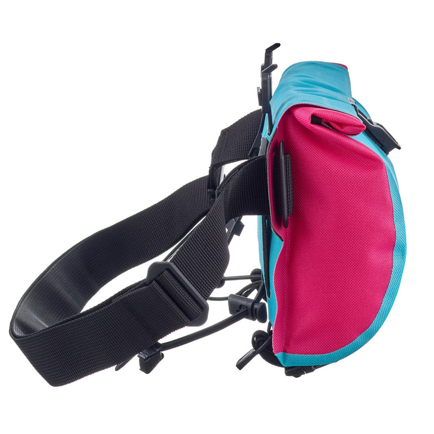 Banane Ortlieb Velo-Sling 3L en rose et turquoise avec fixation guidon, sacoche convertible pour cyclistes urbains