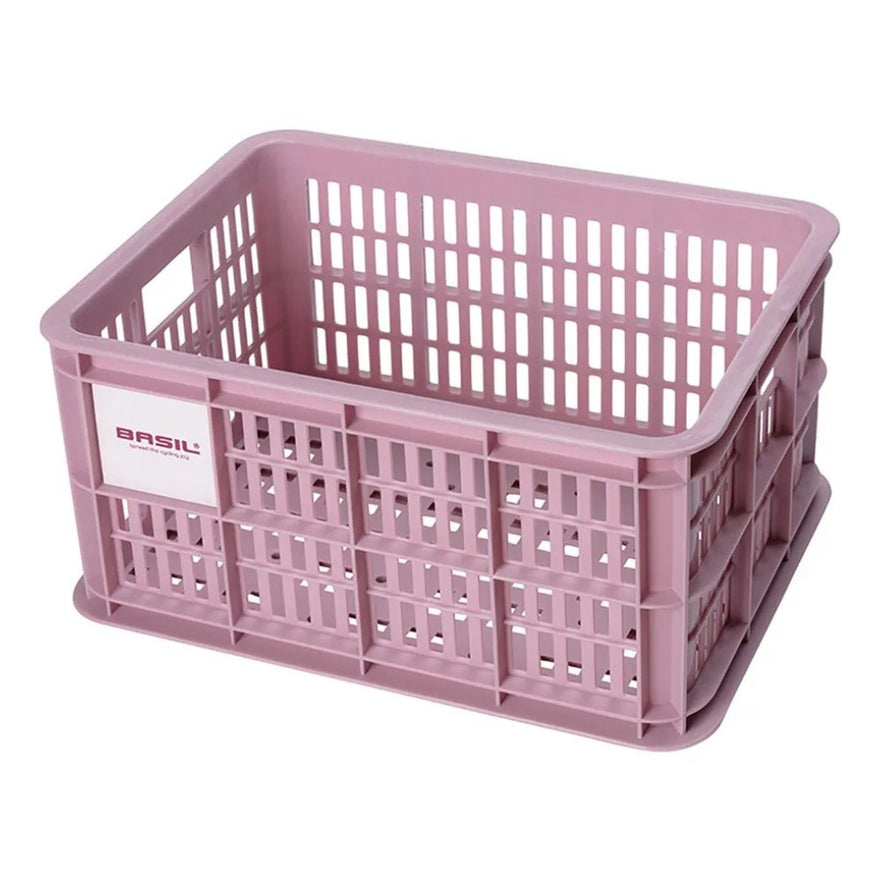 Caisse vélo Basil Crate rose pour porte-bagages, légère et aérée pour un transport urbain pratique et sécurisé
