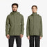 Ensemble pluie vélo Basil Hoga unisexe vert avec veste imperméable et pantalon noir pour cyclistes