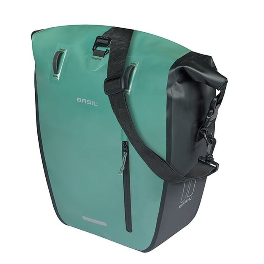 Sacoche imperméable Basil Rivo verte avec bandoulière détachable pour vélo urbain, pratique et résistante