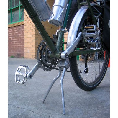 Béquille vélo repliable sur un coté