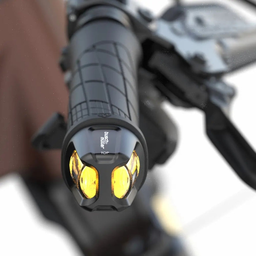 Clignotants velo Busch Muller Turntec T2 a batterie montes sur guidon de velo pour plus de securite