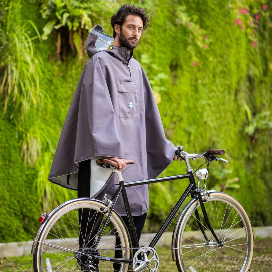 Cape de pluie imperméable vélo adulte unisexe recyclée, idéale pour la mobilité urbaine.