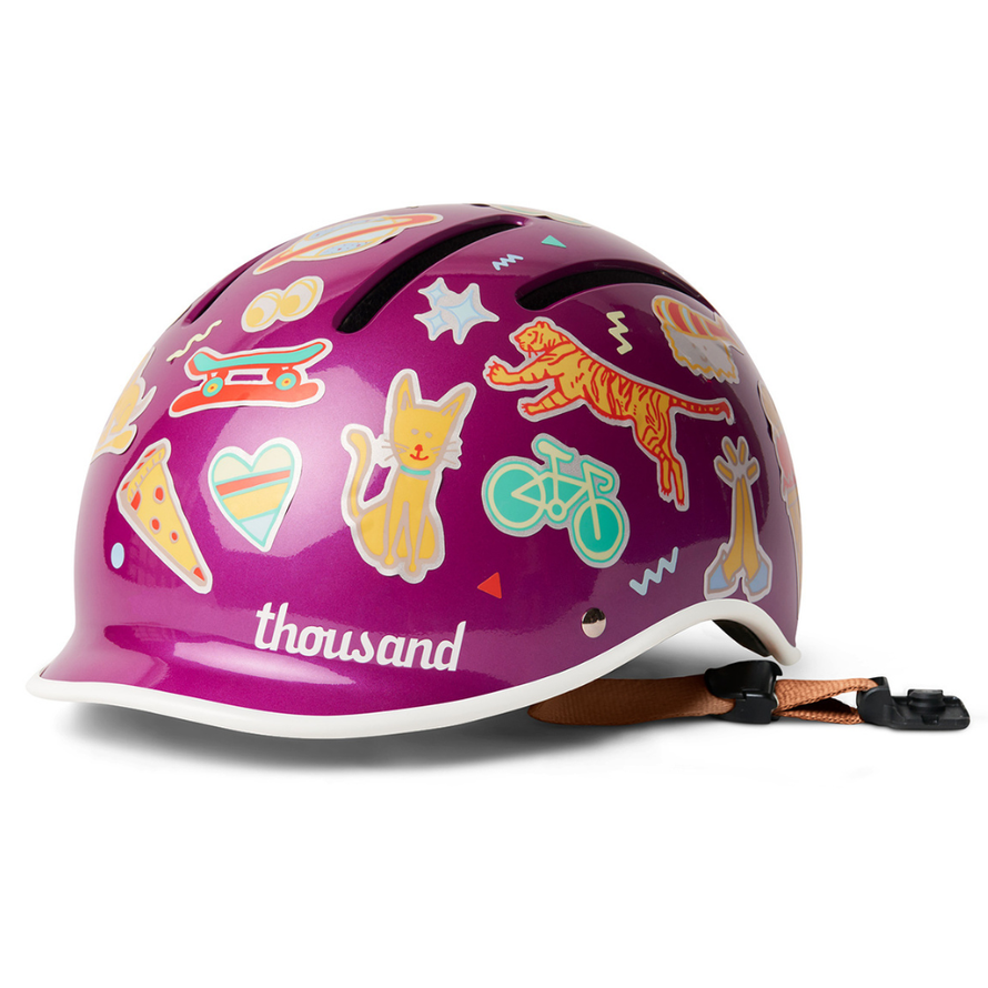 Casque vélo enfant Thousand Jr Vivid Violet décoré d’autocollants, vue trois quarts