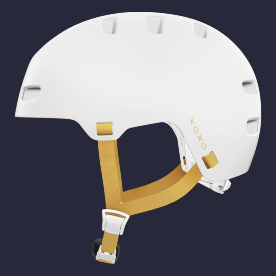 Casque Abus Xoxo blanc avec sangles jaunes et style moderne pour cyclistes urbains