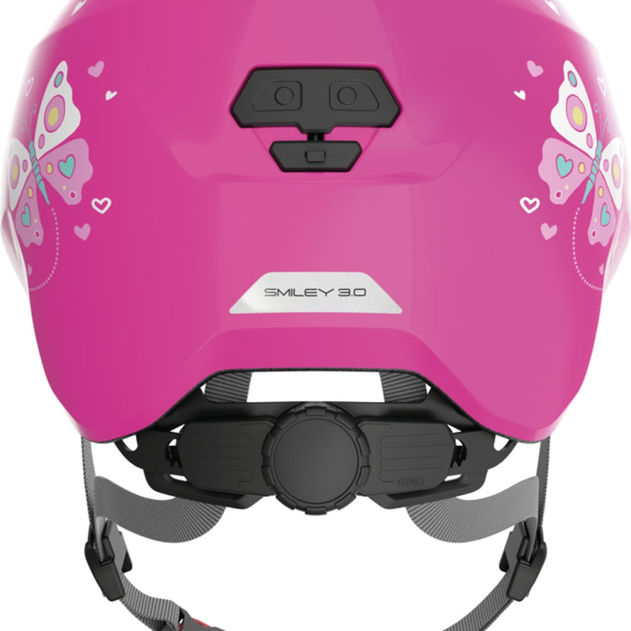 Casque vélo bébé Abus Smiley 3.0 rose avec papillons, sécurité optimale et réglage confortable