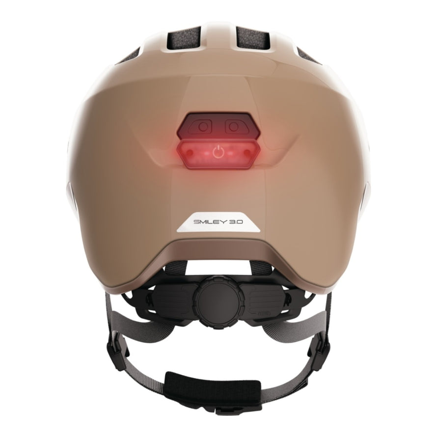 Casque vélo enfant Abus Smiley 3.0 FL.ACE LED beige avec éclairage arrière et réglage sécurisé