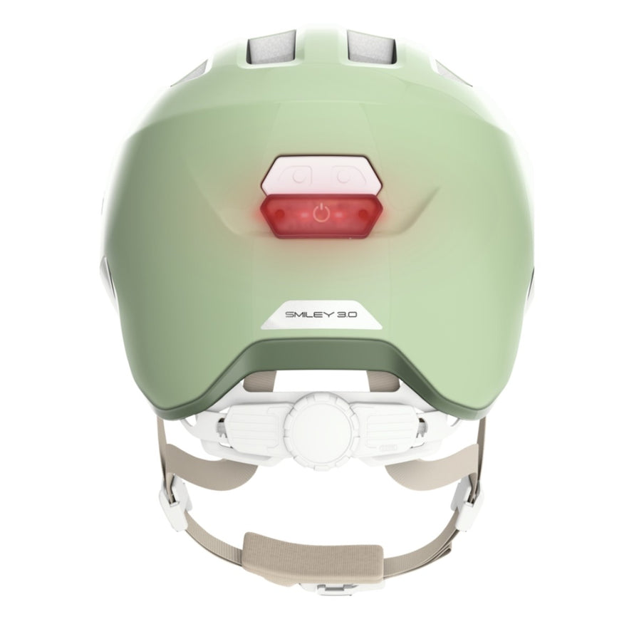 Casque vélo enfant Abus Smiley 3.0 FL.ACE LED vert avec éclairage arrière et réglage précis de la fermeture magnétique