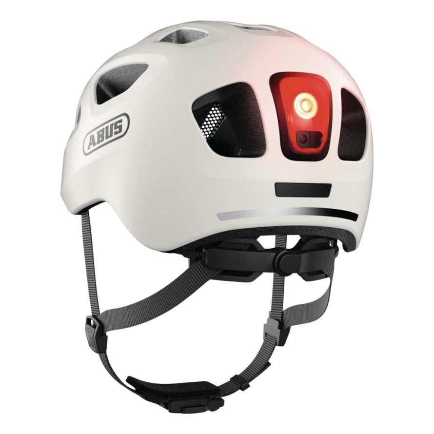 Casque velo enfant Abus Youn-I 3.0 blanc avec feu LED arriere pour une securite et un confort adaptes