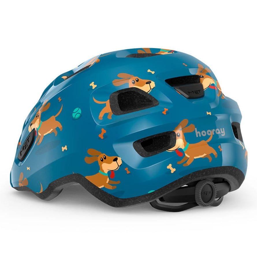 Casque vélo enfant Hourra MET bleu avec motifs chiens et réglage arrière, compatible siège vélo enfant pour sécurité et confort