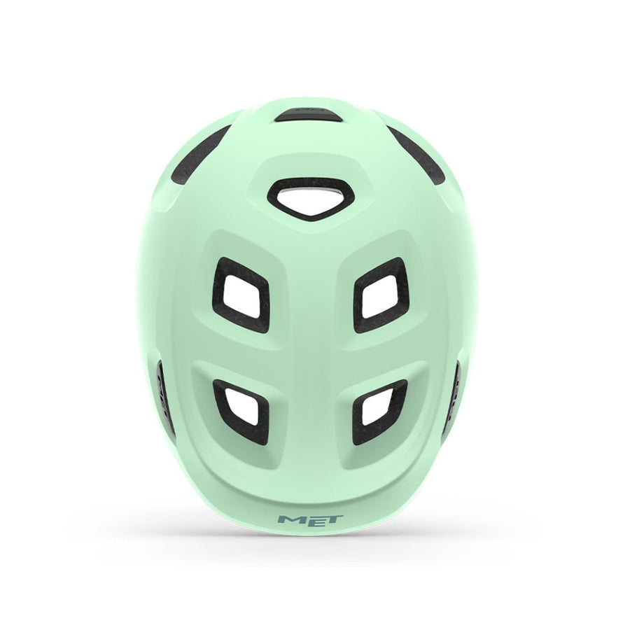 Casque vélo enfant Hourra MET vert pastel avec ventilation, idéal pour siège vélo enfant, sécurité et confort assurés