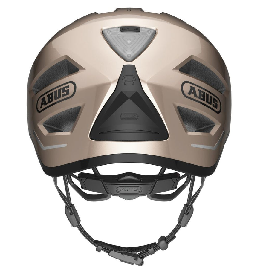Vue arrière du casque vélo Abus Pedelec 2.0 Ace champagne avec lumière intégrée et réflecteurs