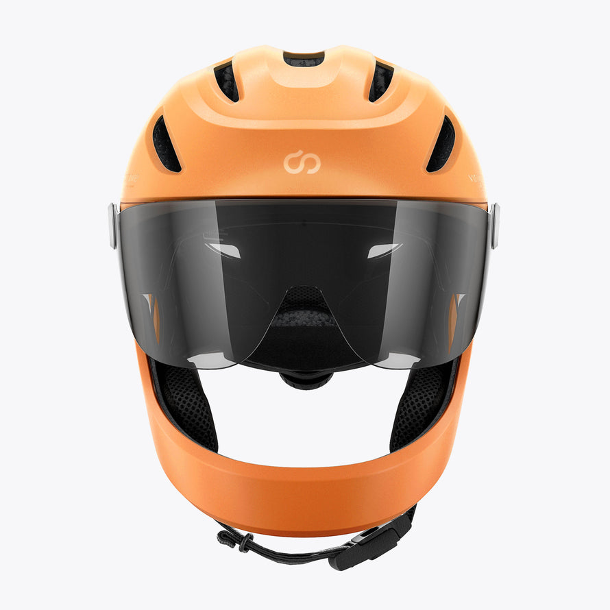 Casque Virgo Integral orange  – Vue de face du casque orange montrant la mentonnière protectrice et la visière. 