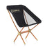 Chaise pliable legere Corto modele avec armature aluminium orange et tissu noir ideal pour camping et cyclisme