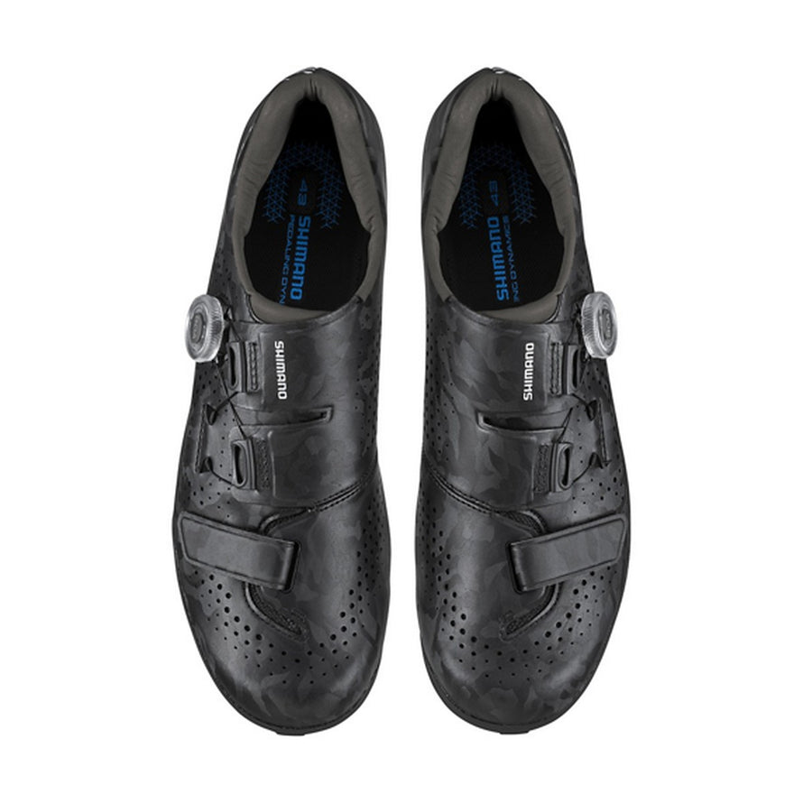 Chaussures gravel homme Shimano SH-RX600 SPD noires camouflage, alliant style et performance pour cyclisme
