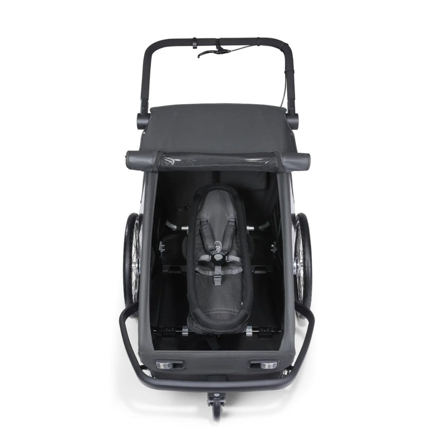 Couchette Yuuna Croozer pour remorque vélo, garantissant sécurité et confort pour bébé lors de vos trajets