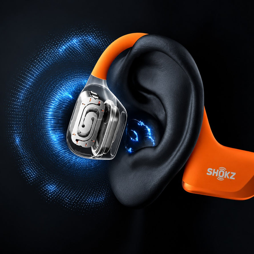 Vue detaillee de la technologie interne des ecouteurs velo Shokz OpenFit Air 2 avec arceau orange