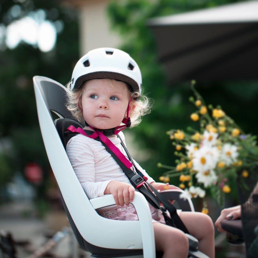 Siege velo enfant inclinable Hamax Caress avec harnais securite et fixation robuste sur porte-bagages
