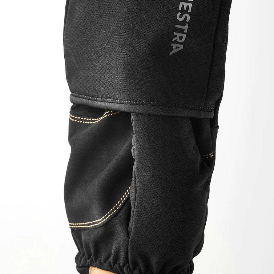 Moufle mitaine Hestra Windbreaker Pull Over Mitt noire avec coutures renforcees pour cyclisme et protection contre le vent