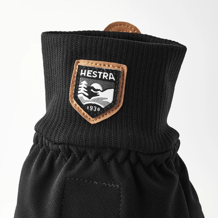 Moufle mitaine Hestra Windbreaker Pull Over Mitt noire avec logo pour cyclisme et protection contre le vent