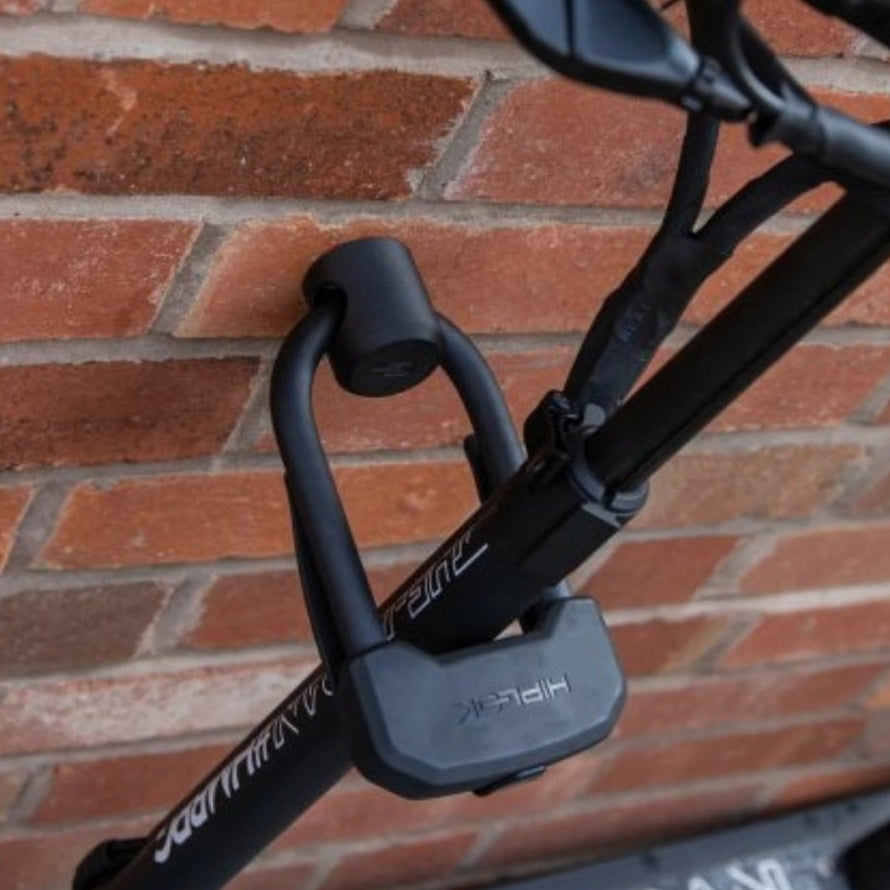 Ancre noire Hiplok Ankr mini pour vélo avec fixation murale sécurisée