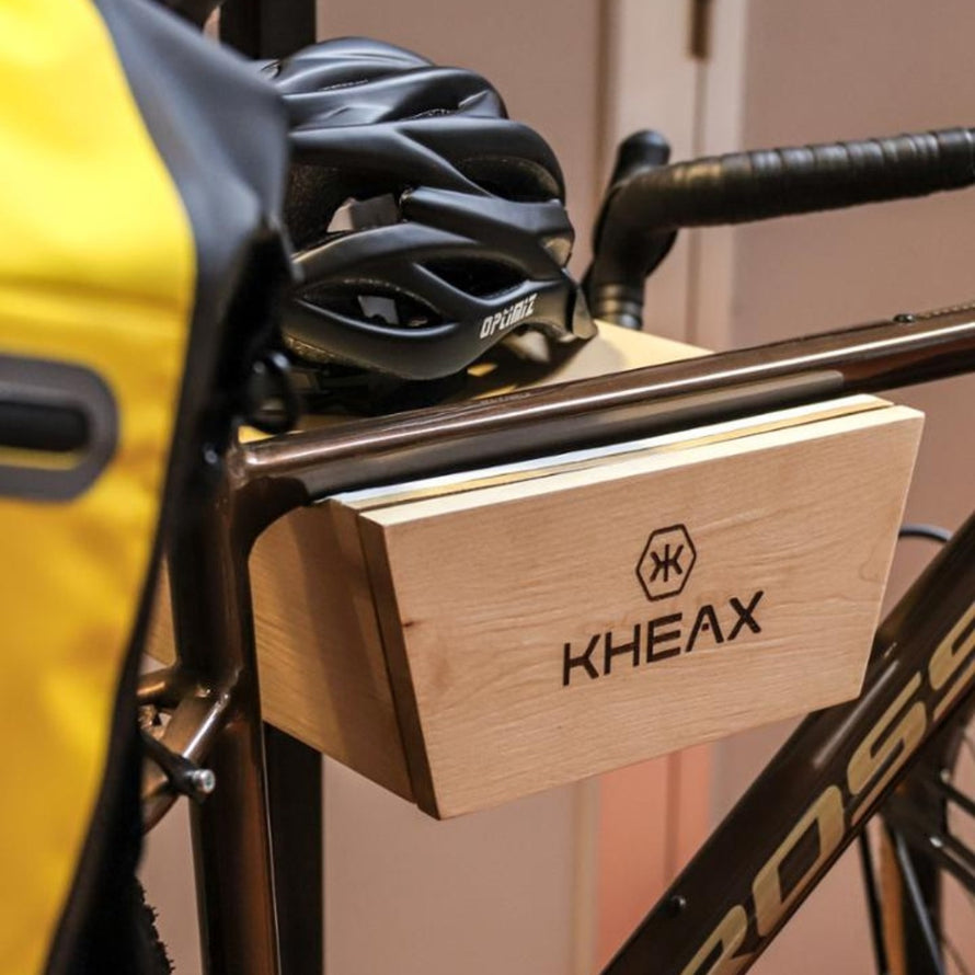 Porte-vélo mural en bois Kheax avec tiroir pour un rangement élégant et fonctionnel du vélo et accessoires