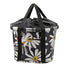 Panier avant vélo Klickfix Bikebasket 15L avec motif fleurs blanches sur fond noir, pratique et élégant pour la ville