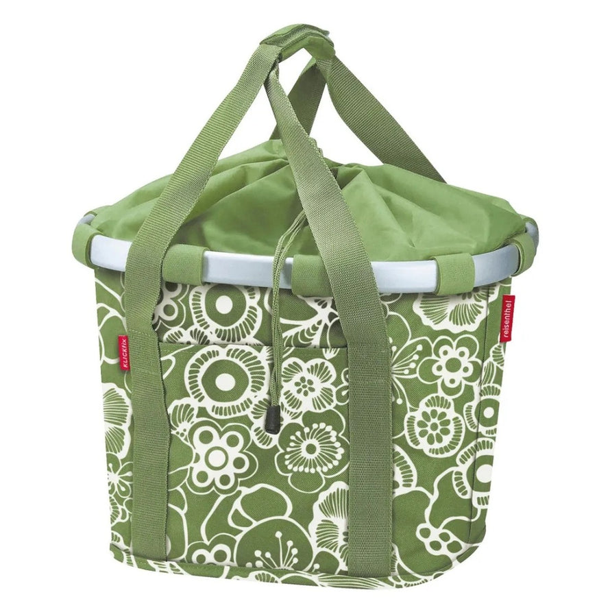 Panier avant vélo Klickfix Bikebasket 15L vert à fleurs blanches, pratique et élégant pour vos trajets urbains