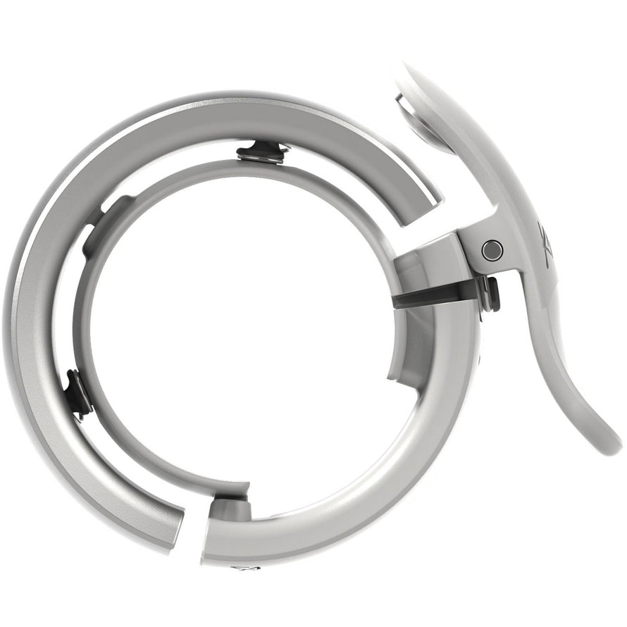 Sonnette Knog Oi Bell Prima Small blanche, design moderne et compact pour cyclisme urbain