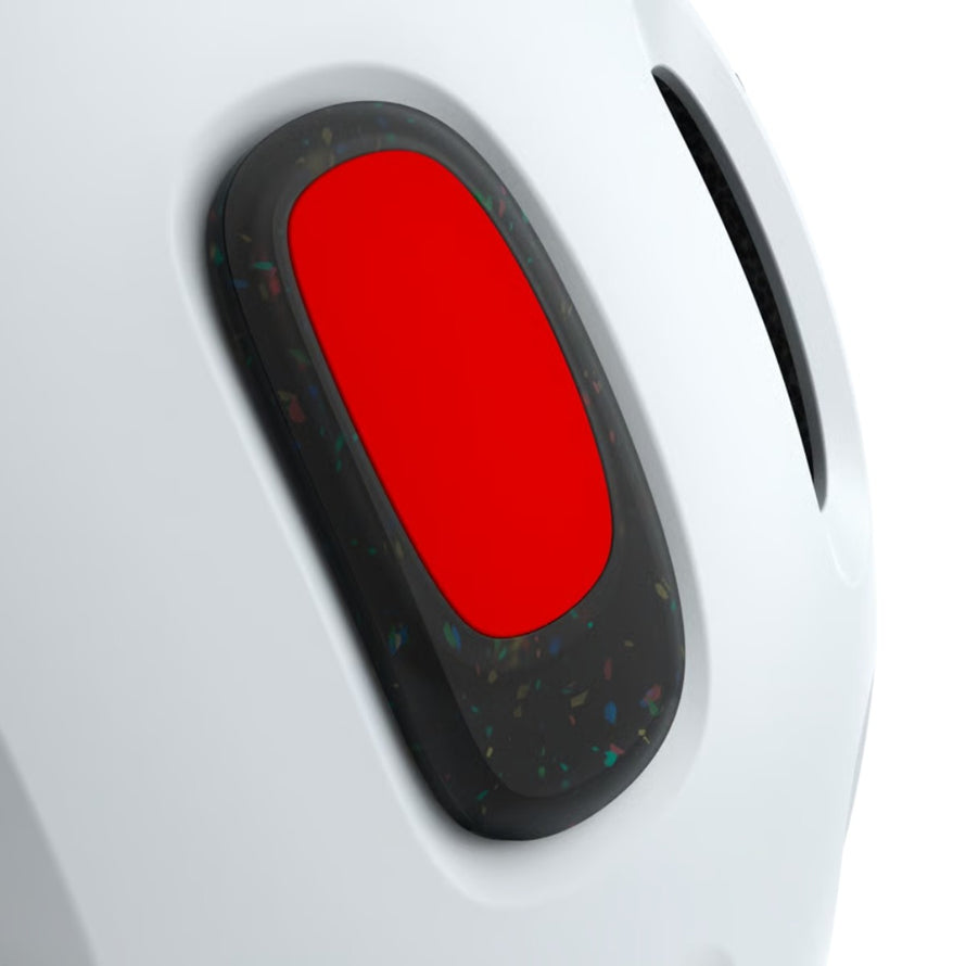 Lampe LED rechargeable Woom READY pour casque enfant, assure visibilité et sécurité renforcée en vélo