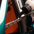 Lubrifiant vélo Dynamic Dry Lube Premium 100ml appliqué sur chaîne pour performance optimale