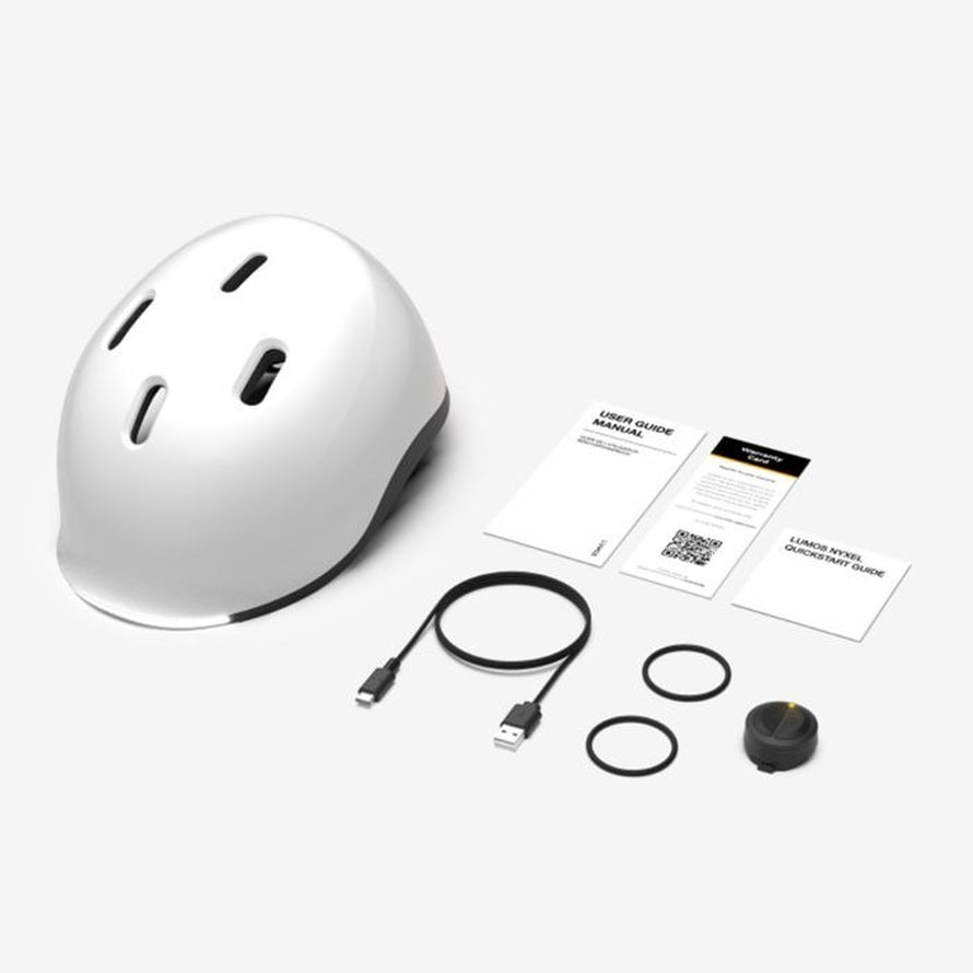 Casque vélo Lumos Nyxel blanc avec éclairage LED et accessoires pour sécurité et confort du cycliste