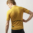 Maillot manches courtes en laine merinos GripGrab EXPLR Merinotech couleur moutarde pour cyclistes exigeants