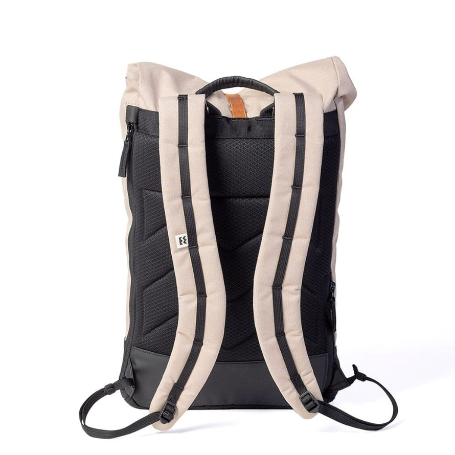 Dos du sac a dos roll-top imperméable MeroMero Wanaka beige et noir, confort et robustesse pour cyclistes urbains