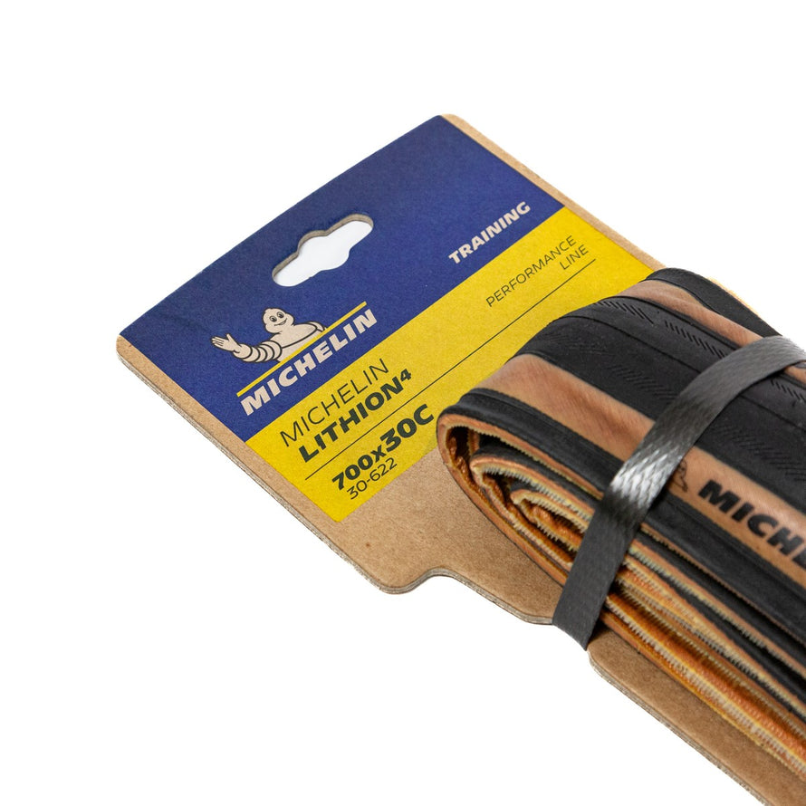 Pneu vélo route Michelin Lithion 4 700x30c avec bande brune, alliant performance et style pour cyclistes exigeants