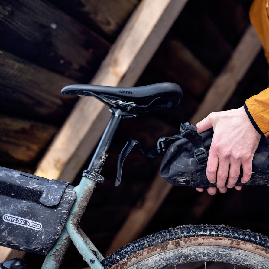 Sacoche de selle Ortlieb Seat-Lock 13 L noire avec fixation rapide et protection étanche pour cyclistes exigeants