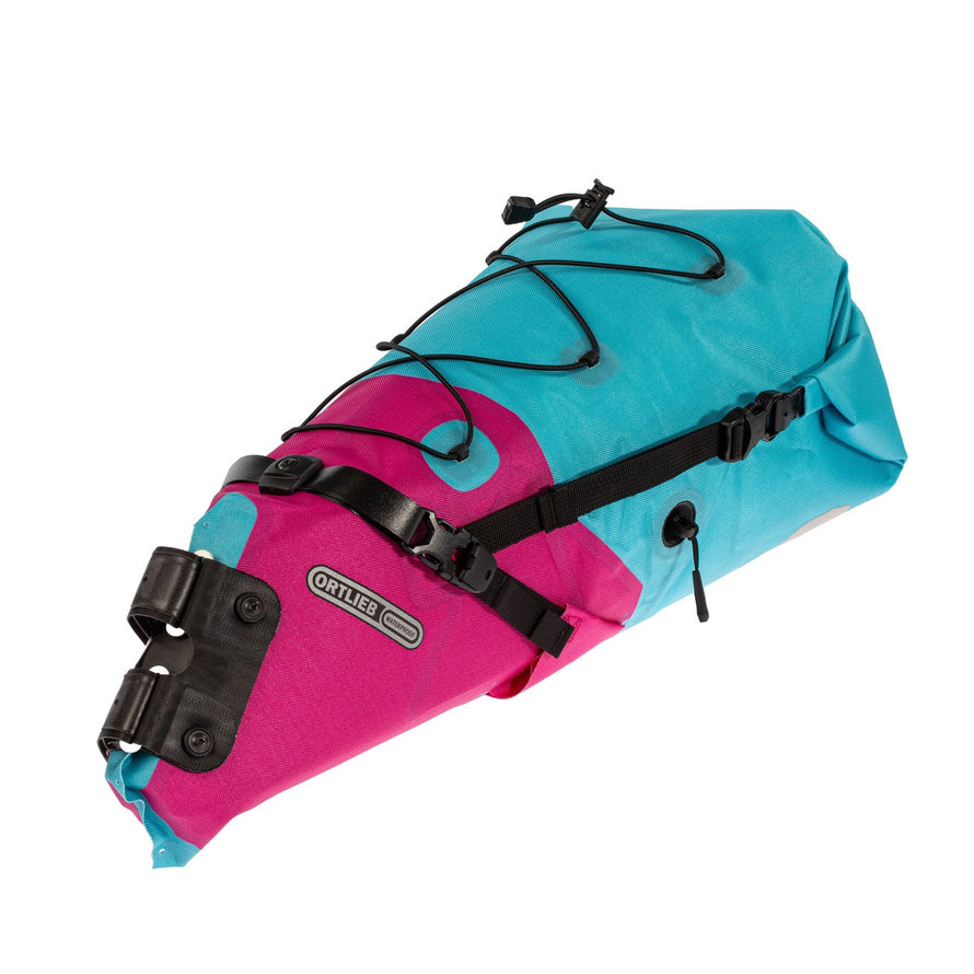 Sacoche de selle Ortlieb Seat-Pack 11-16,5L bleu et rose, étanche et robuste pour bikepacking et voyages à vélo