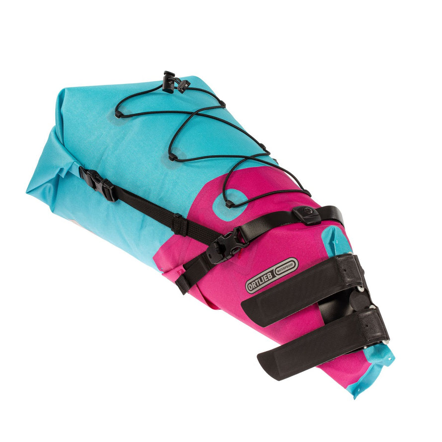 Sacoche de selle Ortlieb Seat-Pack 11-16,5L rose et bleu, étanche et résistante pour bikepacking et aventures vélo